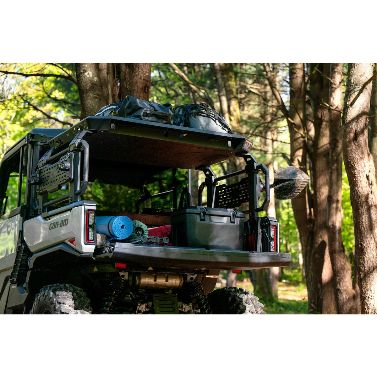 Can-Am Defender with the Cargo Rack Multi-position mounted on the bed wall extenders, 715010078