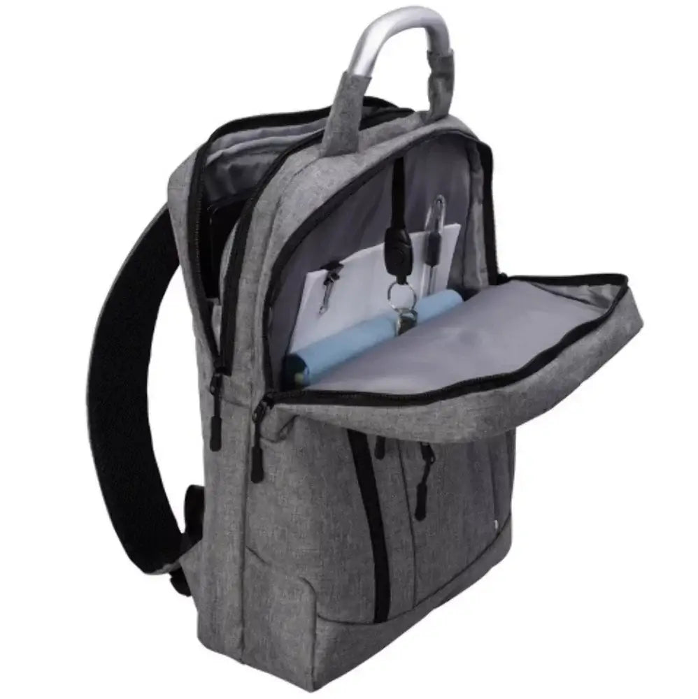 Gray backpack with compartments and items on a white background