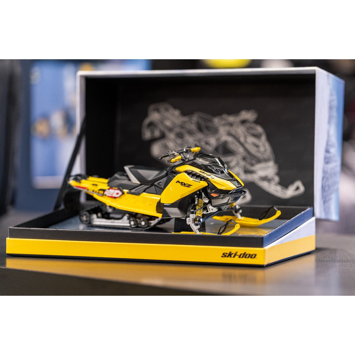 Close-up of MXZ hood, 850 E-TEC decal and front suspension on Ski-Doo diecast replica