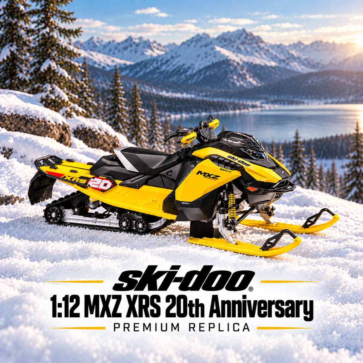 A yellow and black Ski-Doo MXZ XRS 20th Anniversary premium replica snowmobile is shown in a snowy mountain landscape with a lake in the background. Text at the bottom reads 'ski-doo 1:12 MXZ XRS 20th Anniversary PREMIUM REPLICA'.