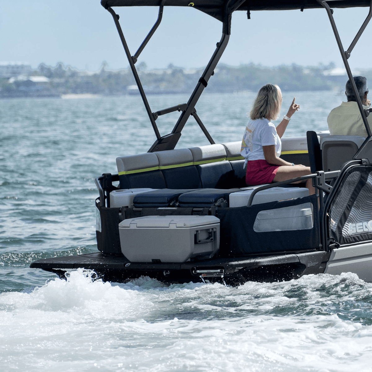 Sea-Doo Switch pontoon rear swim platform with coolers and canopy on water
