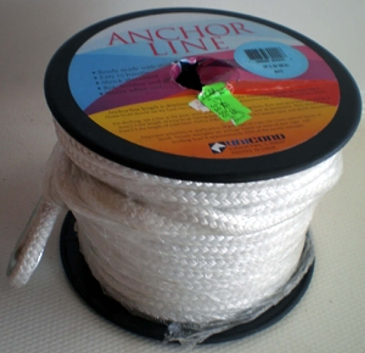 Spool of anchor line with a colorful label on a white background