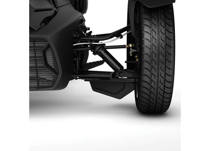 Can-Am Ryker front wheel splash guard installed on suspension close-up