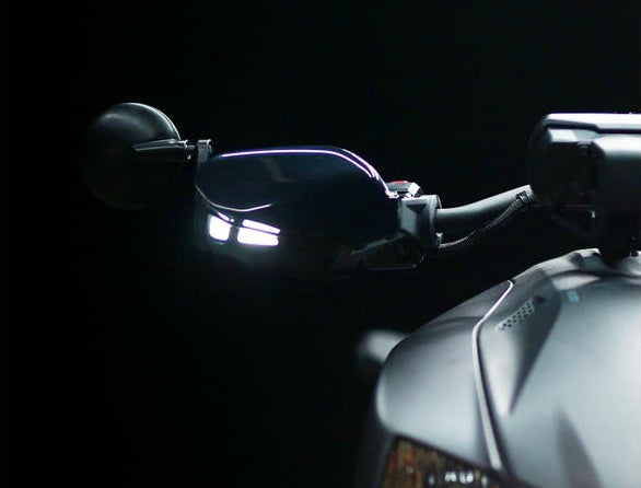 Can-Am Ryker handguard with integrated LED turn signal lighting, close-up view