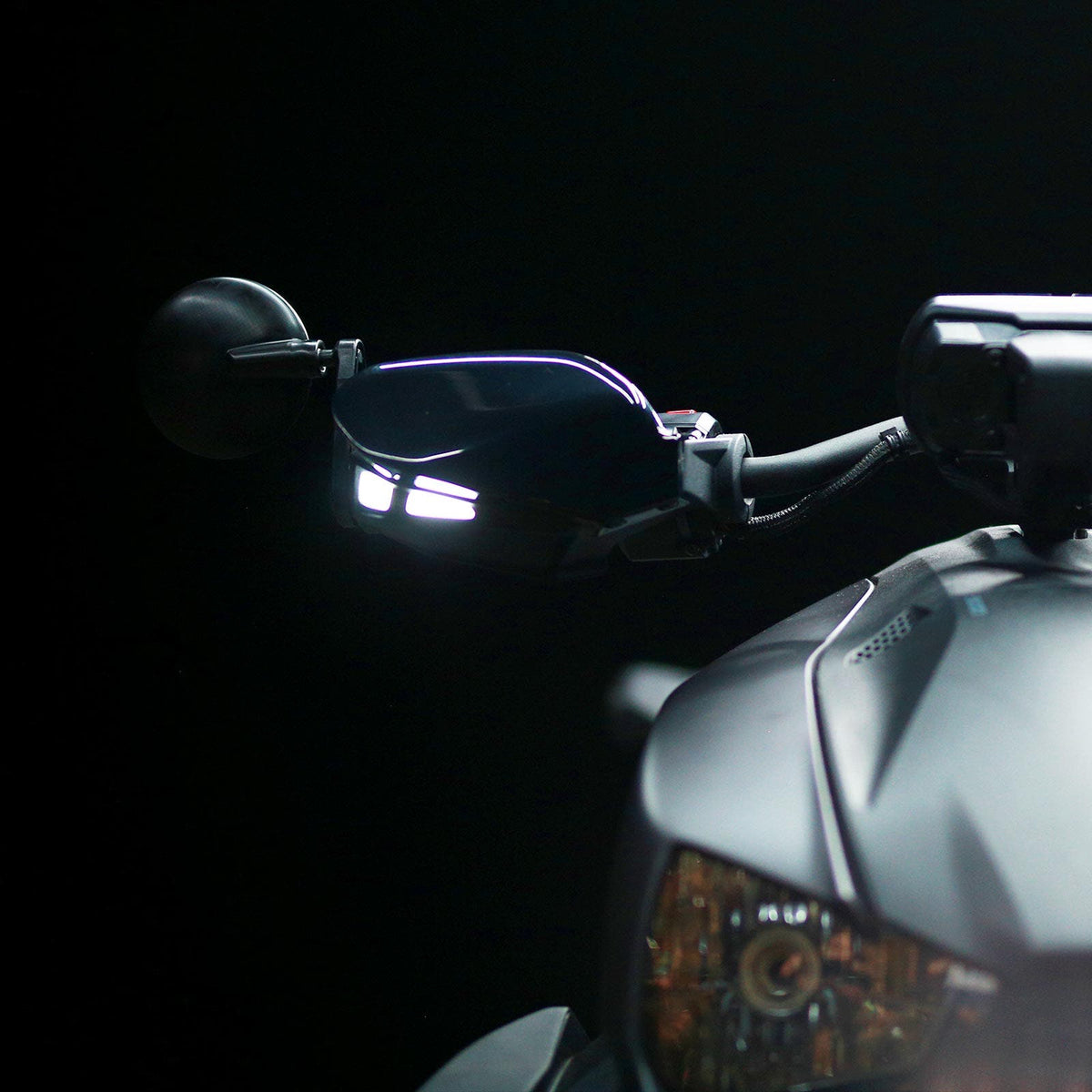 Can-Am Ryker handguard accent lighting installed on aluminum handguard, close-up