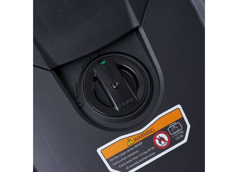 Can-Am Spyder RT LinQ rack close-up showing rotary latch and cargo weight warning label
