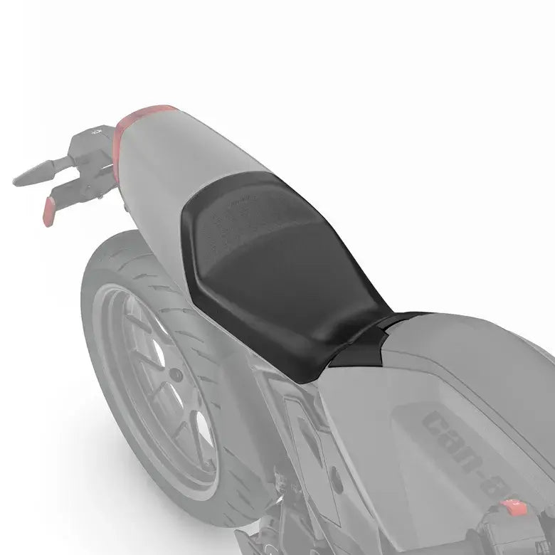 Motorcycle seat with a black cover on a white background