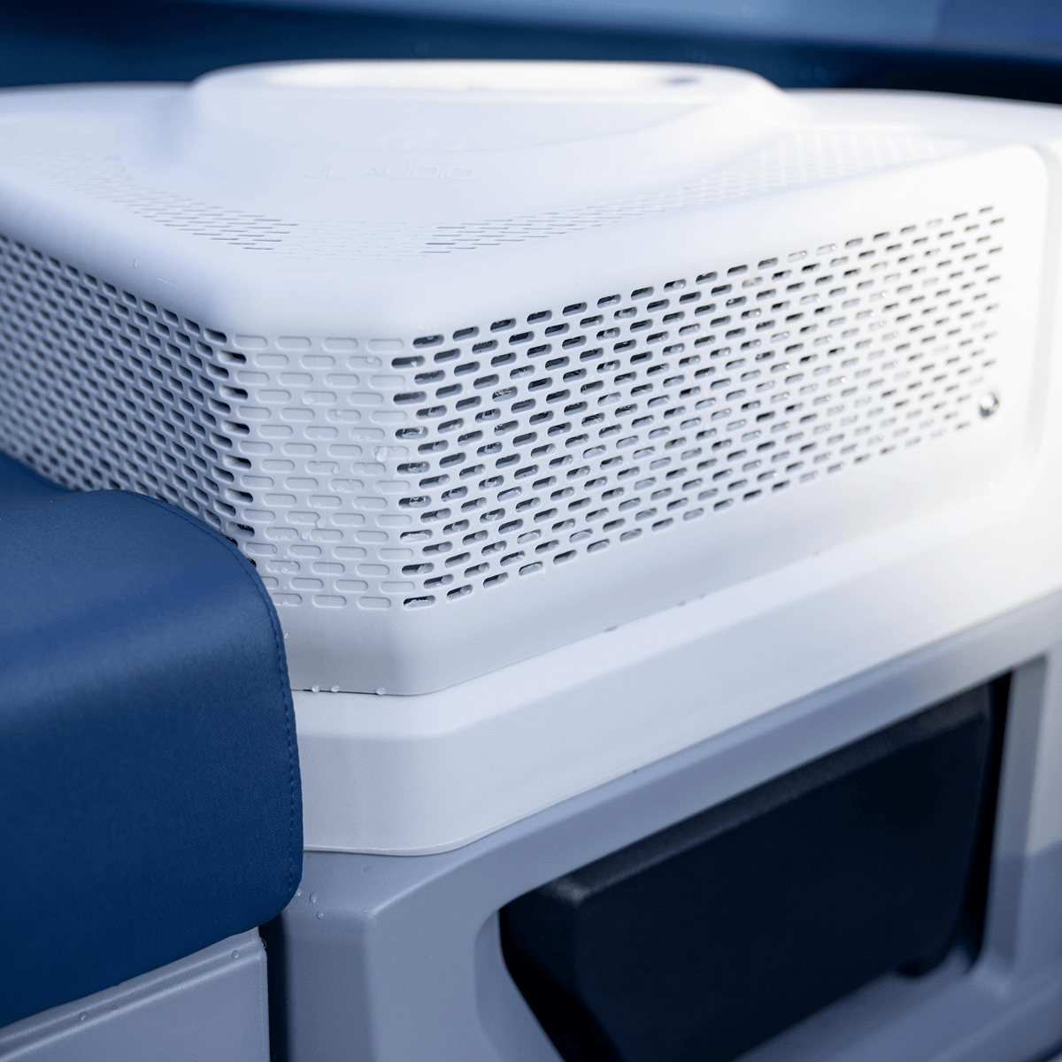 Sea-Doo Switch pontoon JL Audio speaker table close-up white perforated grille