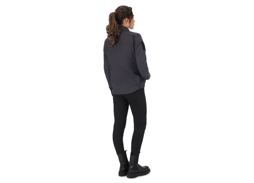 Can-Am On-Road Women's Lipa Customizable Jacket in gray, back view with black leggings and boots