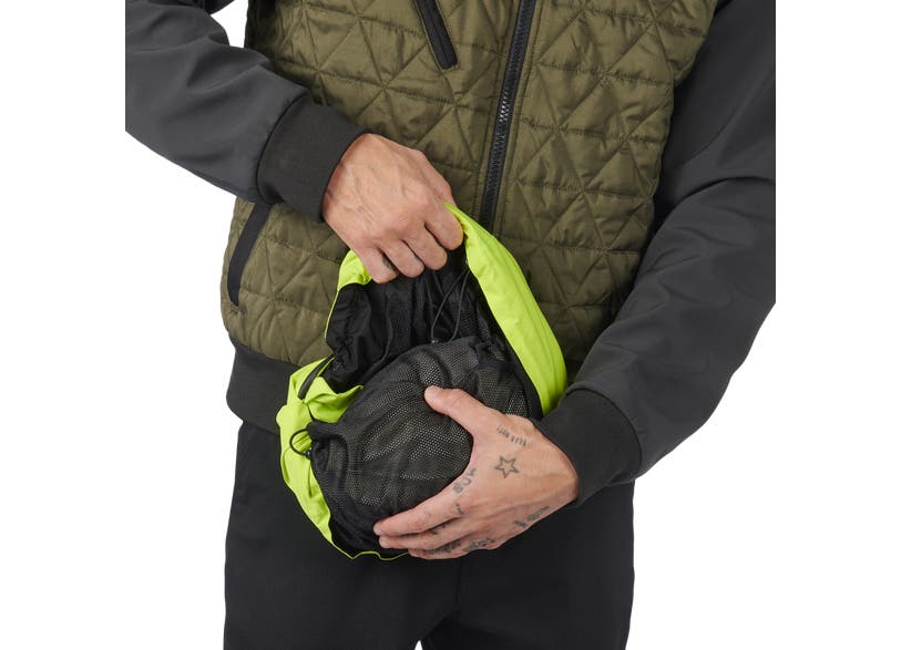 Can-Am Seil packable jacket compressed into hi-vis yellow stuff sack for storage