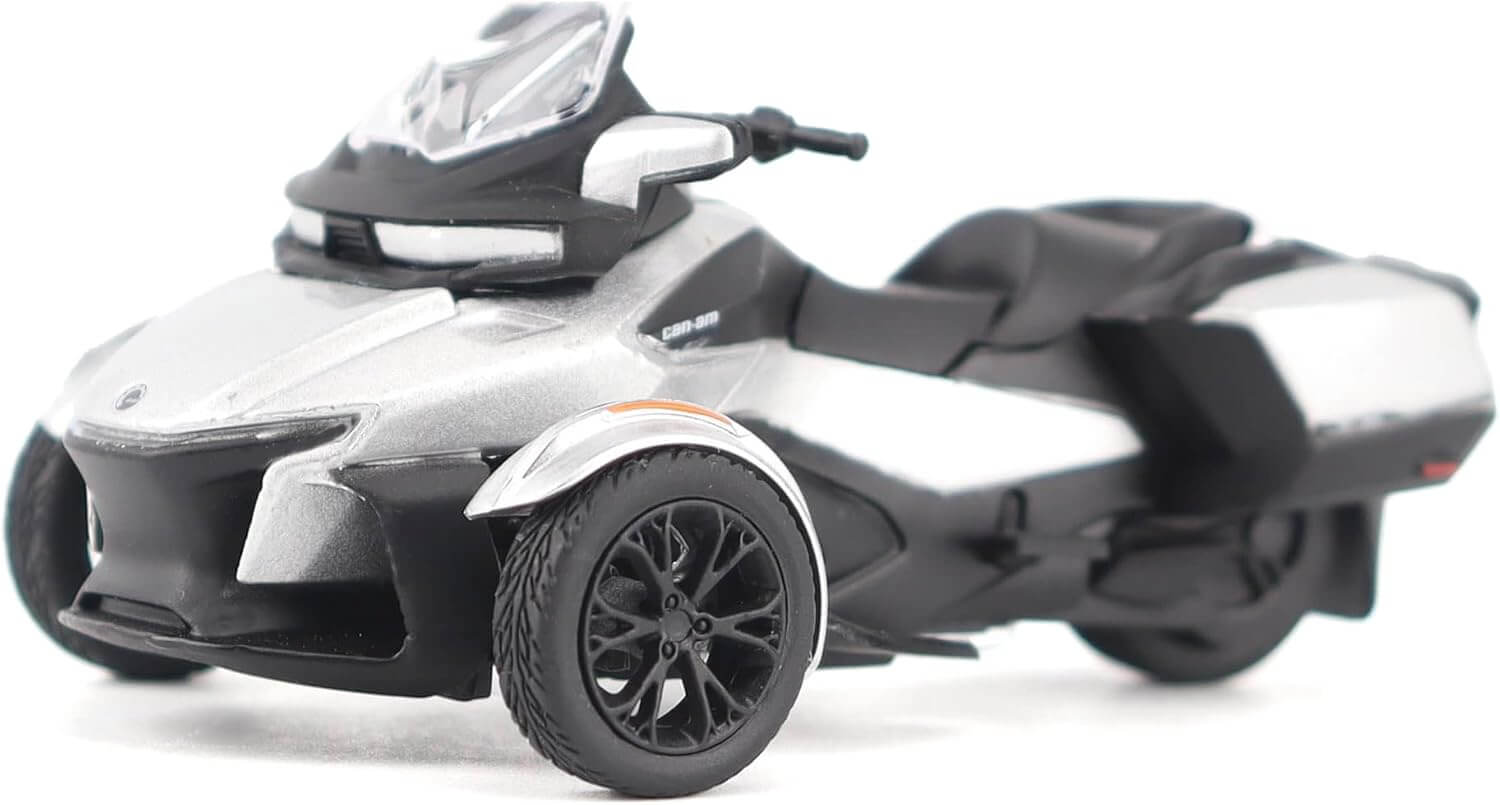 Model of a three-wheeled vehicle on a white background