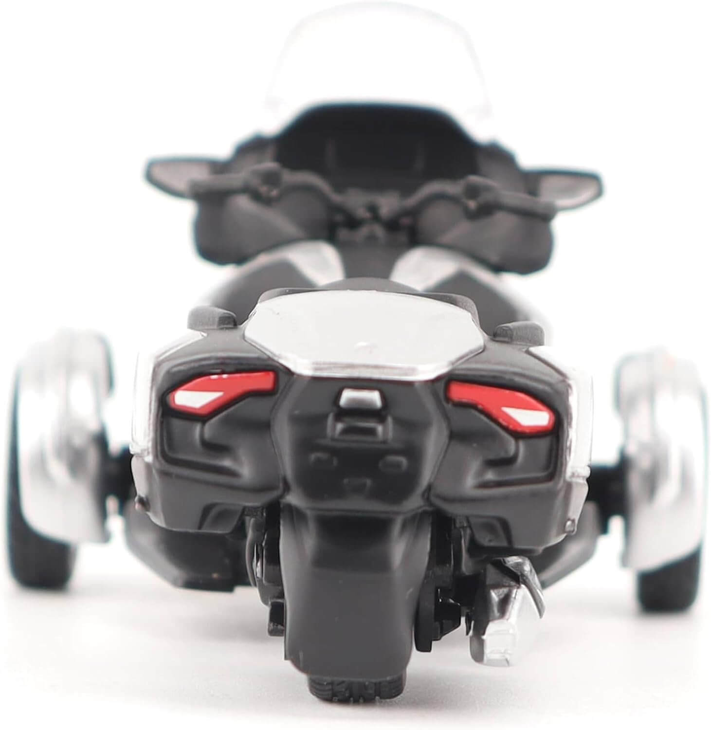 Model of a three-wheeled vehicle on a white background