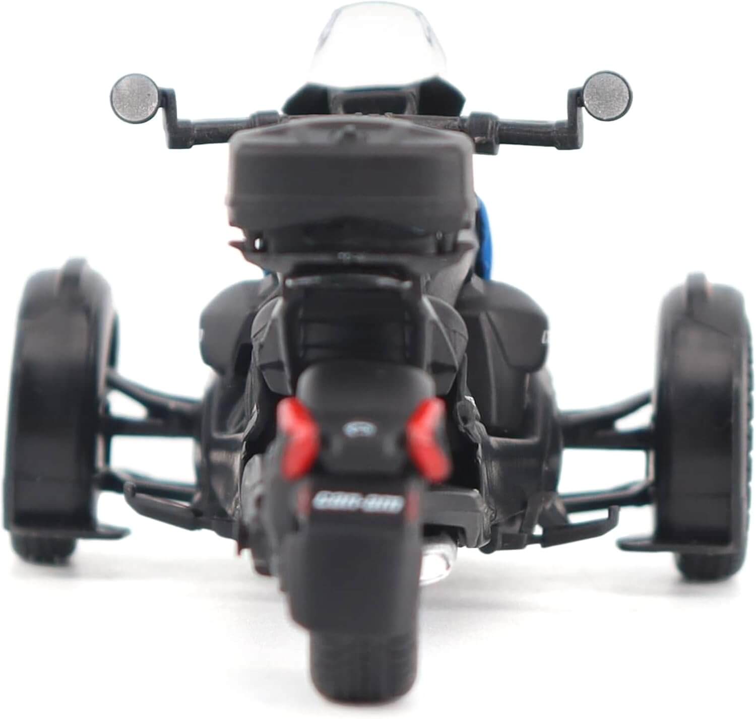 Black three-wheeled model  vehicle on a white background