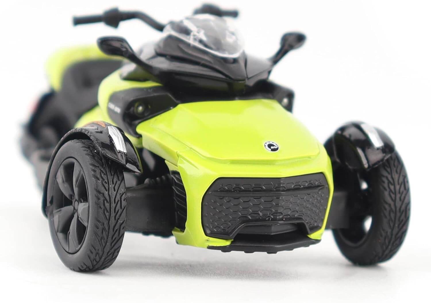 Yellow three-wheeled vehicle on a white background