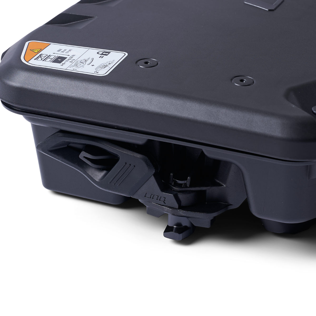 Black BRP LinQ 2.6 gal modular cargo box underside showing quick-attach mounting mechanism