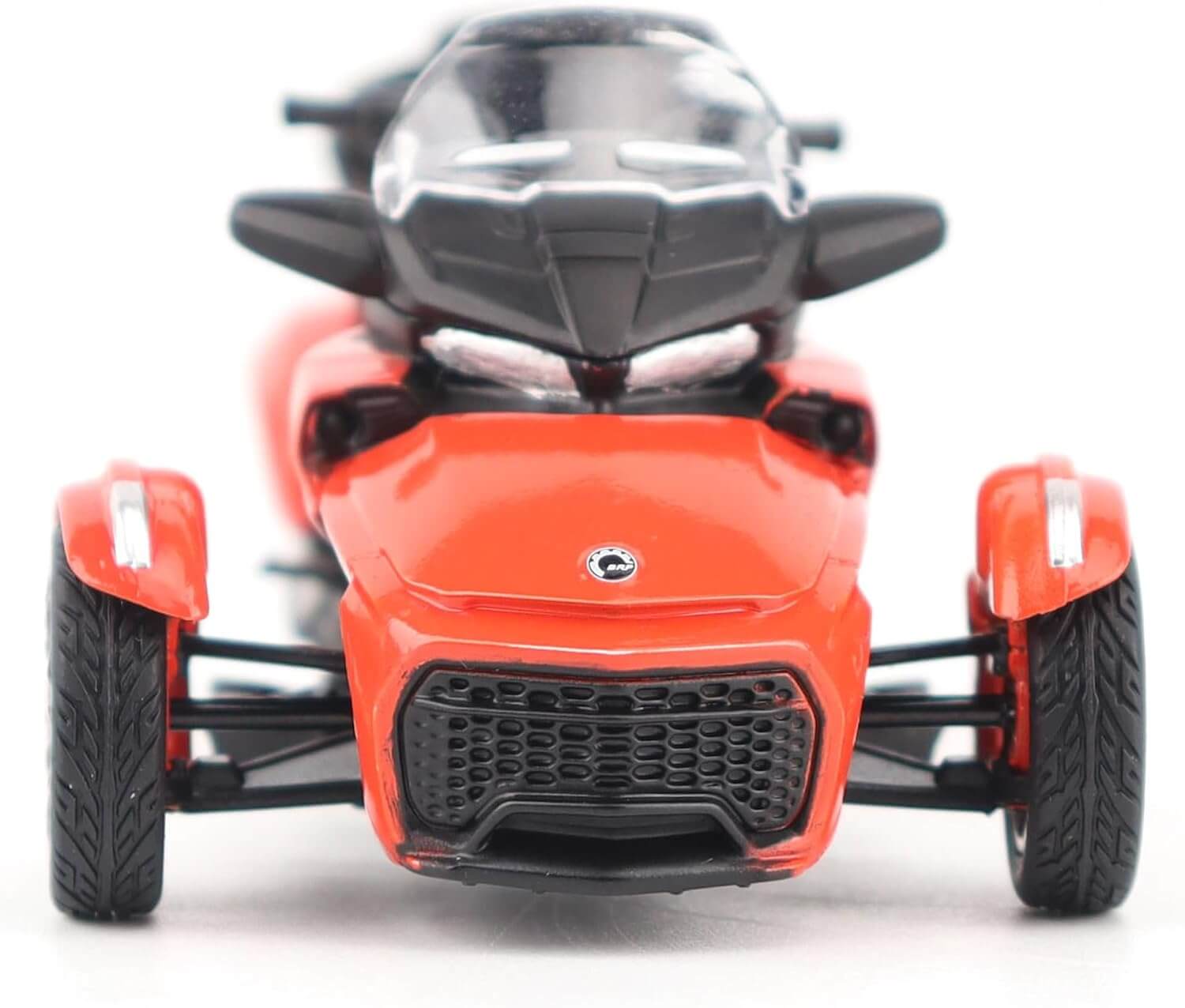 Red three-wheeled vehicle on a white background