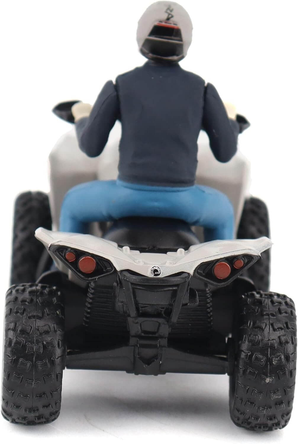 Model of a person riding an ATV on a white background