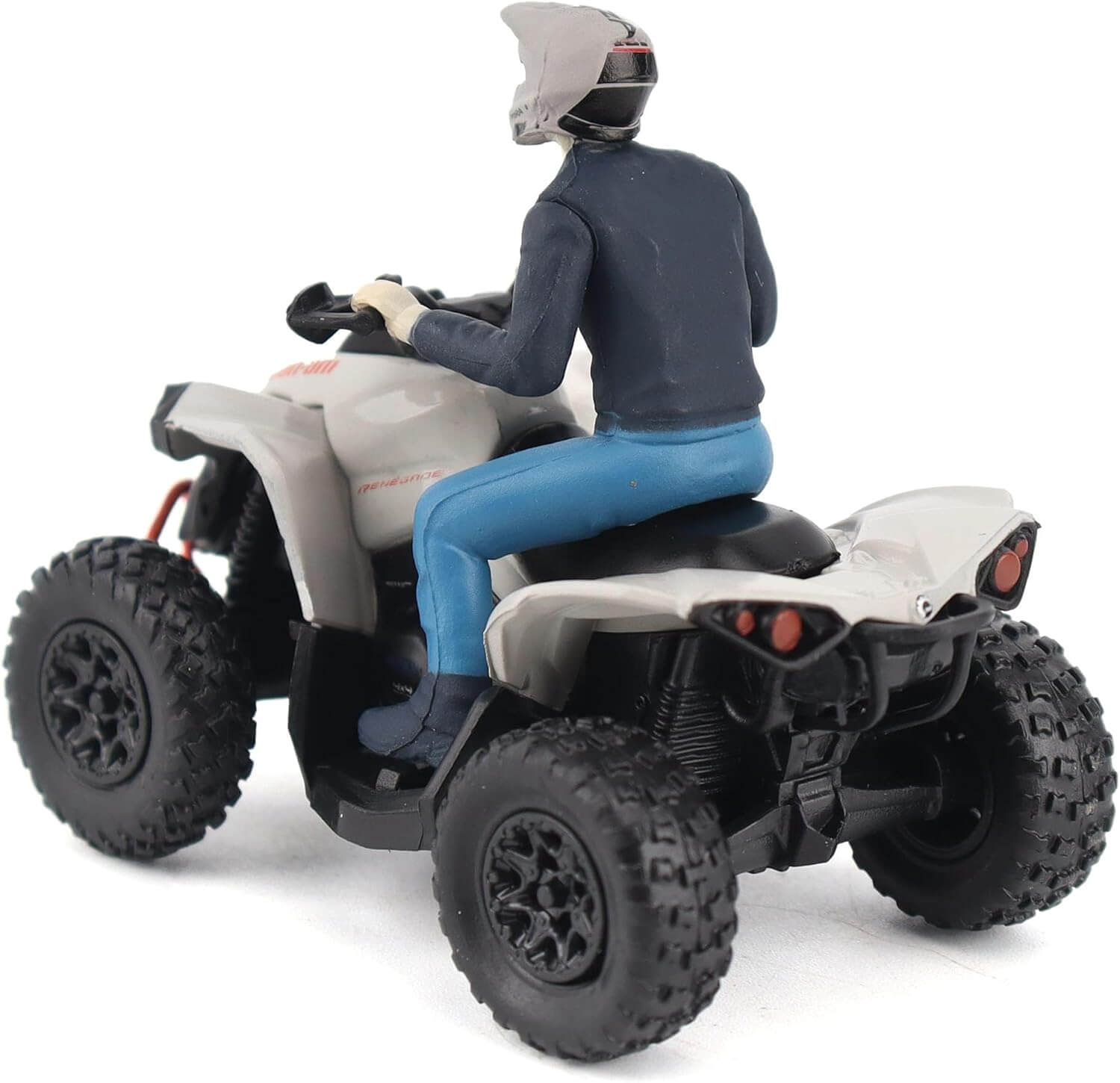 Model of a person riding an ATV on a white background