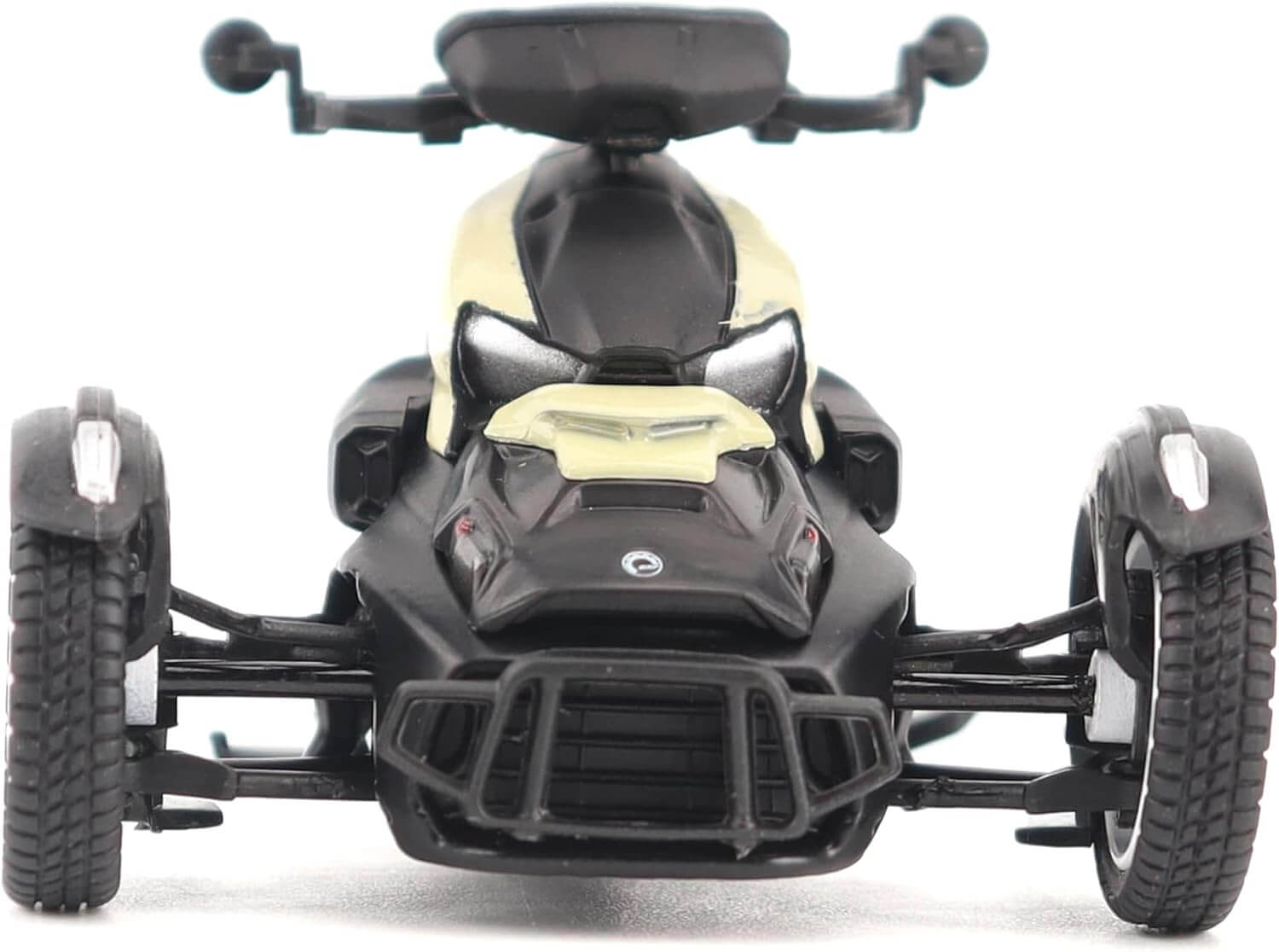 Black and beige toy ATV on a white background