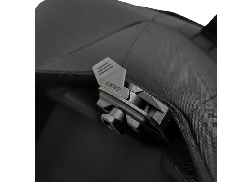 Ski-Doo Trail Combo Bag 31L buckle clip detail on black REV Gen4 narrow snowmobile luggage