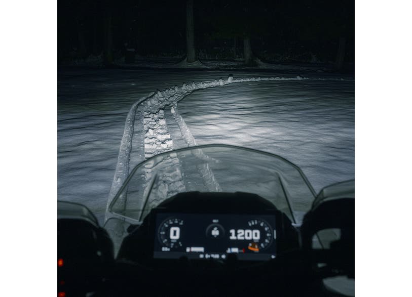 Ski-Doo REV Gen5 snowmobile night ride with auxiliary LED wide light illuminating snow trail, 860202428