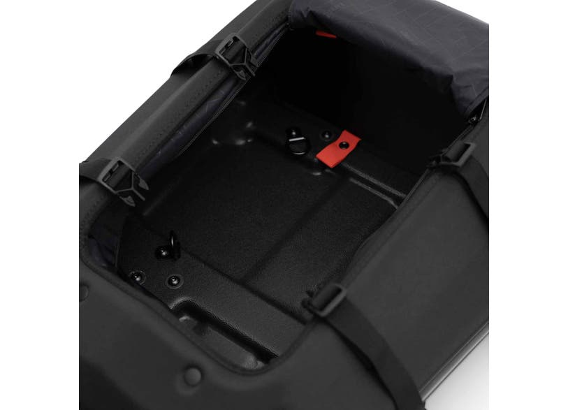 Ski-Doo LinQ 40L Adventure Tunnel Bag interior view showing storage compartment and buckles