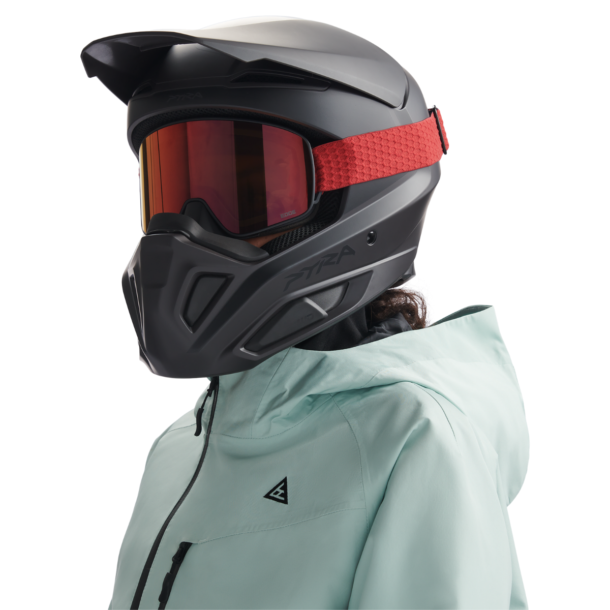 Rider wearing the Ski-Doo Pyra Ultra-Light Helmet 929041 in Charcoal Grey