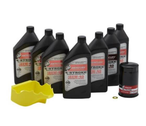Collection of Mercury marine oil bottles and accessories on a white background