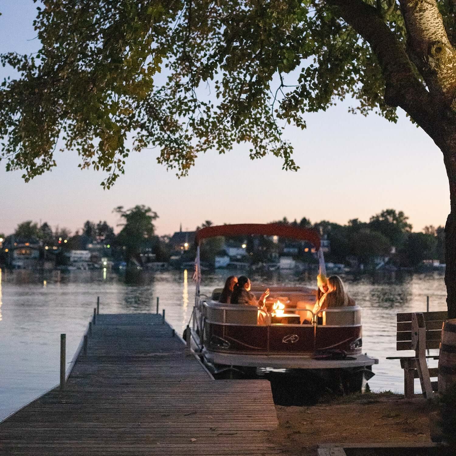 Floating Flame Portable Fire Pit on a boat with flame active