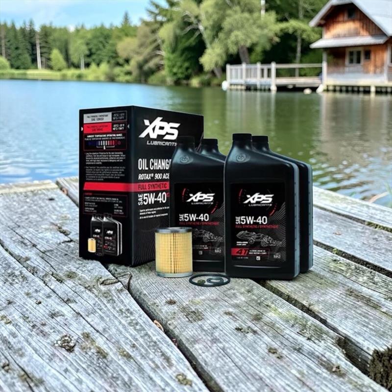XPS lubricants and oil change kit on a wooden dock by a lake