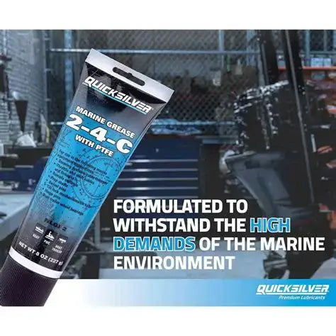Quicksilver marine grease tube with text on a blurred background