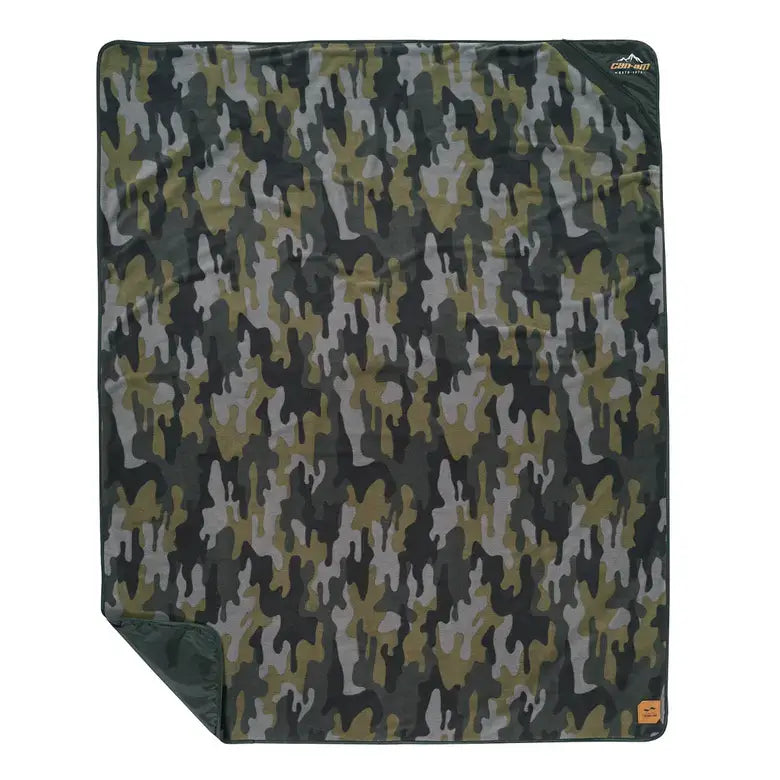 Camouflage-patterned blanket with a brand logo on a white background