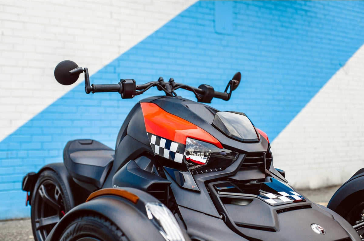 Can-Am Ryker cluster relocator black mounted on handlebar of three-wheeler
