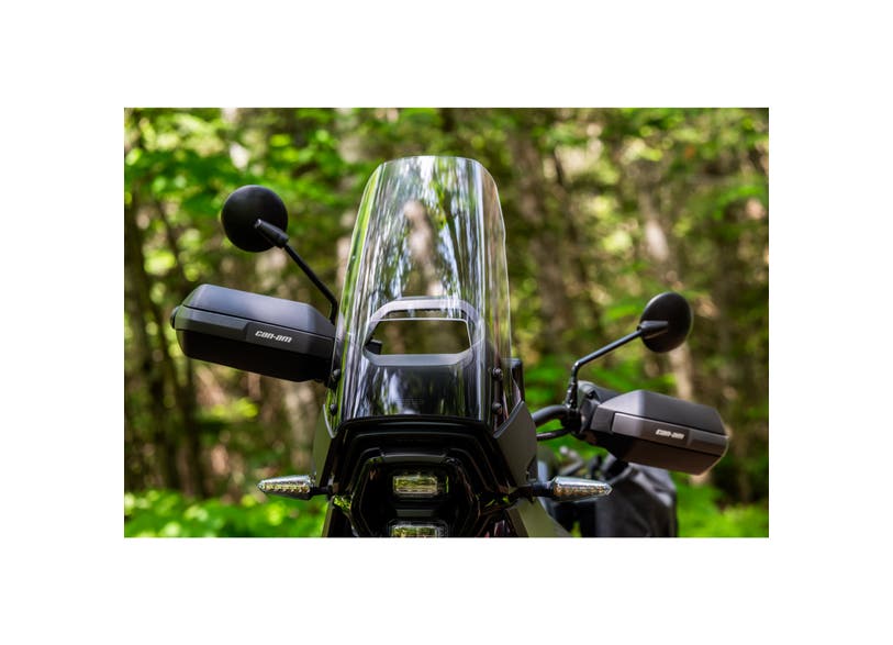 Can-Am Origin LinQ adjustable windshield installed on EV motorcycle cockpit view with mirrors