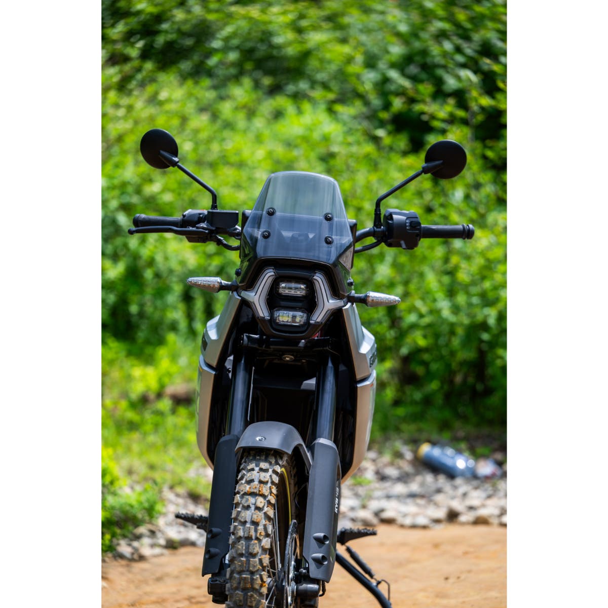Can-Am Origin front view showing LED headlight and front position lamp on adventure motorcycle