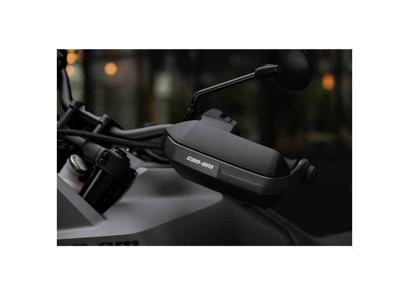 Can-Am Origin and Pulse aluminum handguard mounted on EV motorcycle handlebar closeup