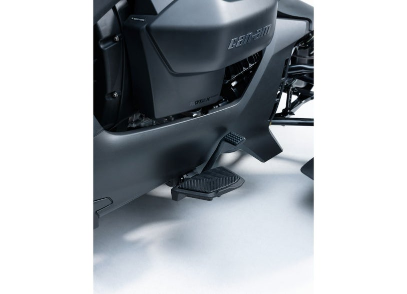 Can-Am Ryker floorboards close-up showing Rotax engine cover and footpeg detail