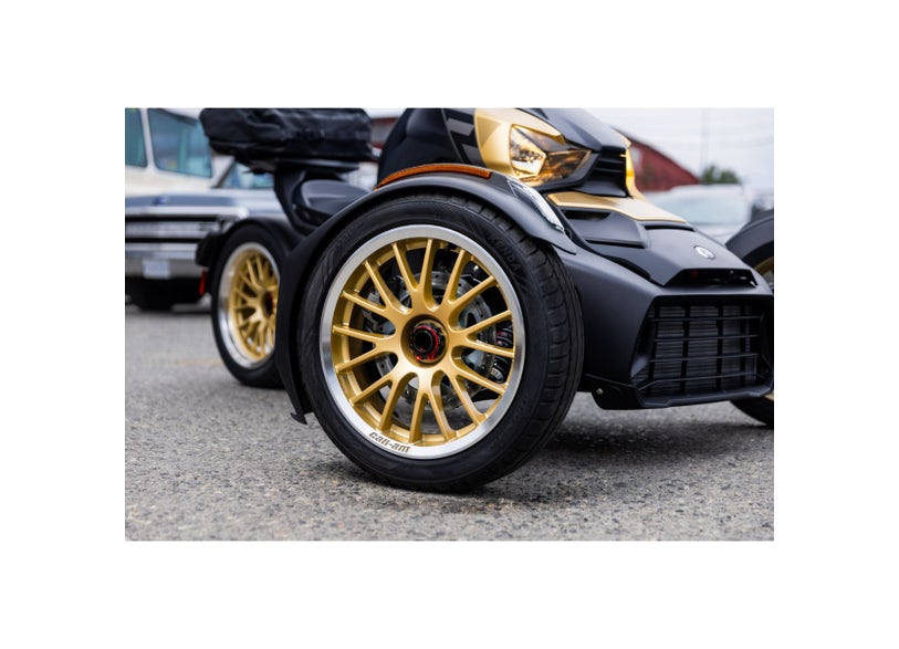 Can-Am Circuit front wheel liquid gold on Ryker three-wheeler, close-up view