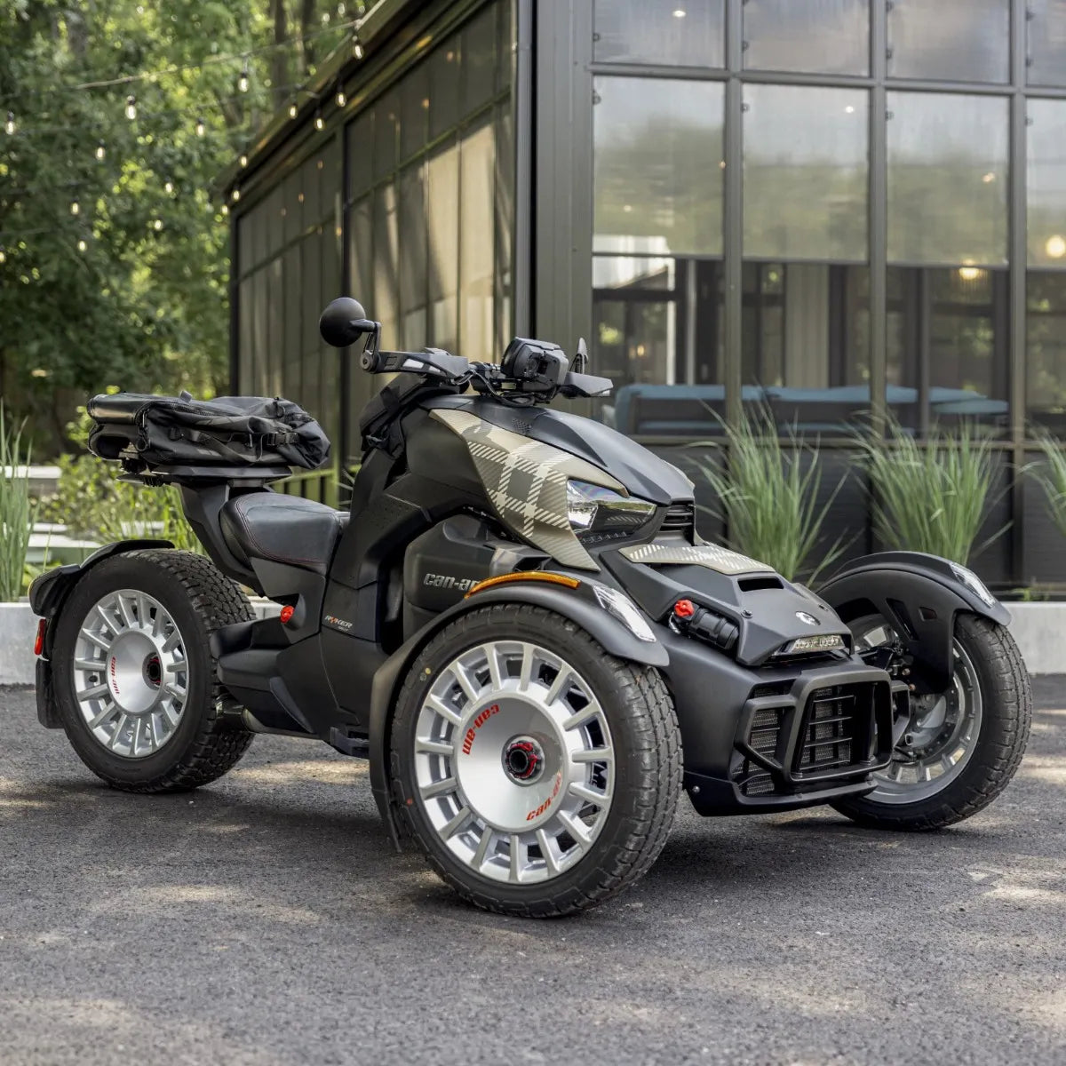 Can-Am Ryker three-wheeler with Moka Plaid exclusive panel kit, front quarter view outdoors