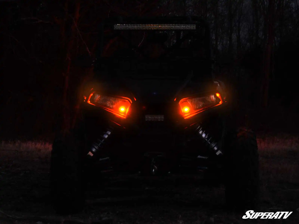 SuperATV Universal Turn Signal Kit, front LED turn signals at night, side angle, TSK-003